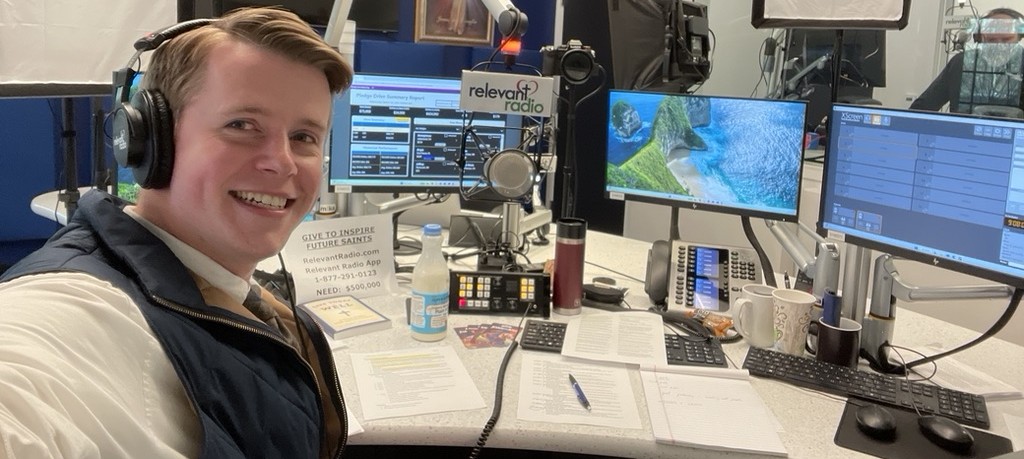 Peter at the microphone in the Relevant Radio studio